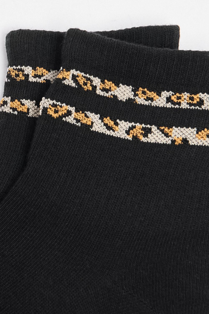 Medias cortas unicolores con diseños de animal print