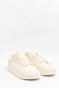 Tenis unicolores casuales con suela plana y texto estampado