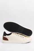 Tenis casuales cremas claros con contrastes posteriores