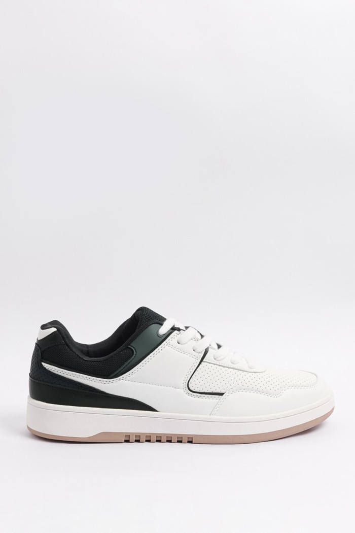 Tenis unicolores casuales con contrastes y perforaciones