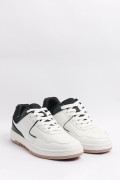 Tenis unicolores casuales con contrastes y perforaciones