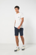Camiseta college crema clara con cuello redondo y bolsillo
