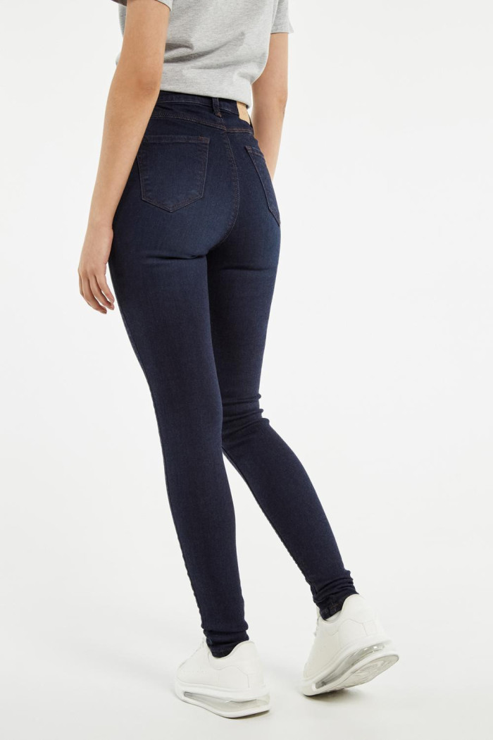 Jean jegging azul intenso tiro súper alto con costuras cafés