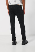 Jean ajustado skinny negro con cremallera y tiro bajo