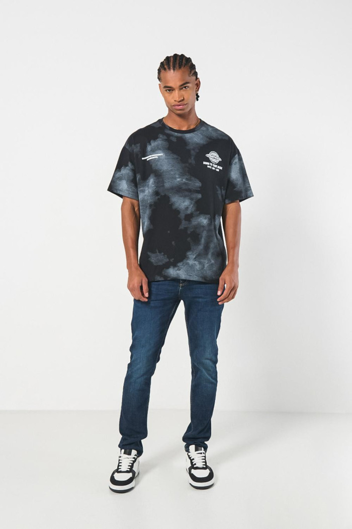 Jean ceñido skinny azul oscuro con bolsillos y tiro bajo