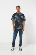 Jean ceñido skinny azul oscuro con bolsillos y tiro bajo