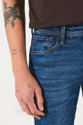 Jean azul slim con tiro bajo, cremallera y ajuste ceñido