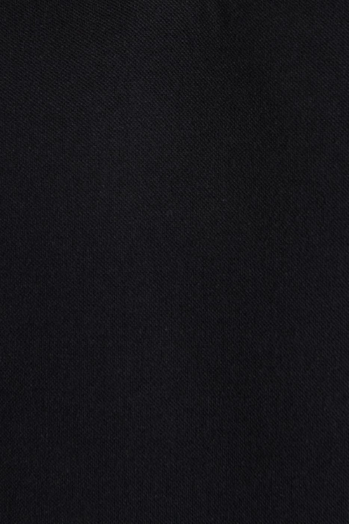 Camiseta polo manga corta unicolor con detalles tejidos