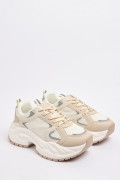 Tenis de plataforma unicolores con cortes y cordones