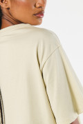 Camiseta crop top kaki oversize con cuello redondo