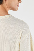 Camiseta crema clara oversize manga corta con texturas