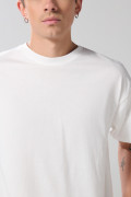 Camiseta oversize manga corta unicolor con corte posterior