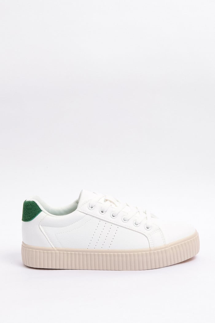 Tenis casuales unicolores con contraste y perforaciones
