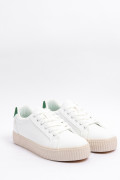 Tenis casuales unicolores con contraste y perforaciones