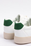 Tenis casuales unicolores con contraste y perforaciones