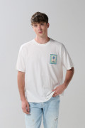 Camiseta oversize cuello redondo crema con arte de playa