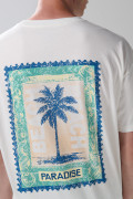 Camiseta oversize cuello redondo crema con arte de playa