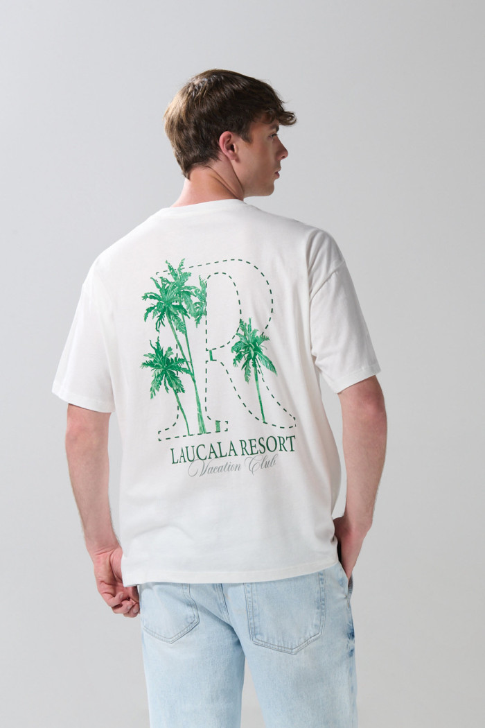 Camiseta oversize crema manga corta con diseños de playa