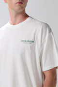 Camiseta oversize crema manga corta con diseños de playa