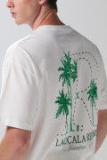 Camiseta oversize crema manga corta con diseños de playa
