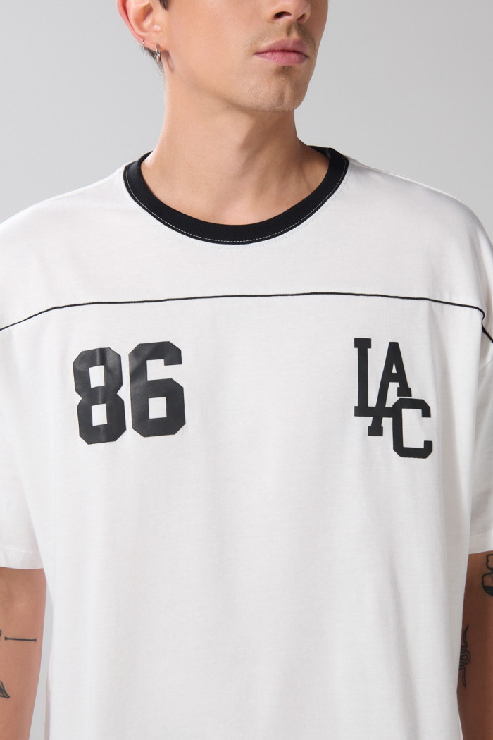 Camiseta manga corta college crema clara oversize