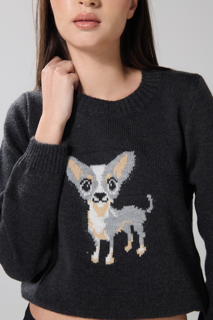 Suéter tejido negro con cuello redondo y diseño de perrito