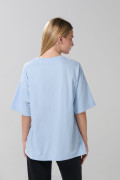 Camiseta oversize azul clara manga corta con diseño de Daisy