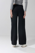 Pantalón unicolor tipo jogger con bota recta y bolsillos
