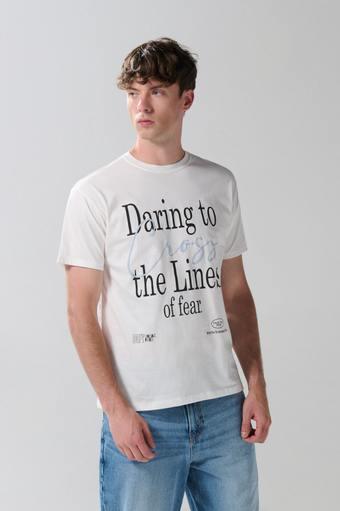 Camiseta unicolor en algodón manga corta con texto