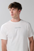 Camiseta unicolor en algodón con textos y manga corta
