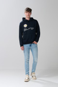 Buzo azul oversize con capota y diseños de disco