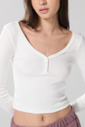 Camiseta unicolor con botones, manga larga y cuello V