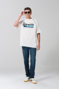 Camiseta de Snoopy oversize crema con manga ranglan corta
