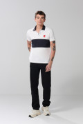 Camiseta polo crema clara con diseño de Snoopy