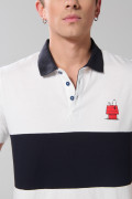 Camiseta polo crema clara con diseño de Snoopy