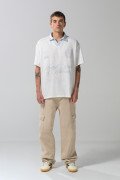 Camiseta oversize polo crema clara con diseño college