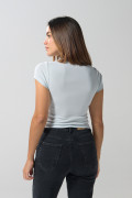 Camiseta unicolor manga corta con texto en frente