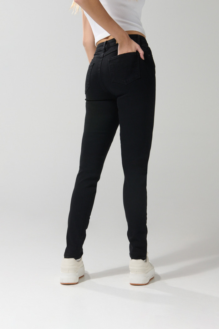 Jean jegging ceñido negro con súper tiro alto y bolsillos