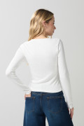 Camiseta ajustada blanca con texturas y manga larga