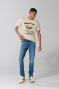 Jean skinny azul claro tiro bajo con ligeros desgastes