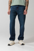 Jean azul oscuro baggy con bota ancha y tiro medio