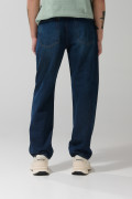 Jean azul oscuro baggy con bota ancha y tiro medio