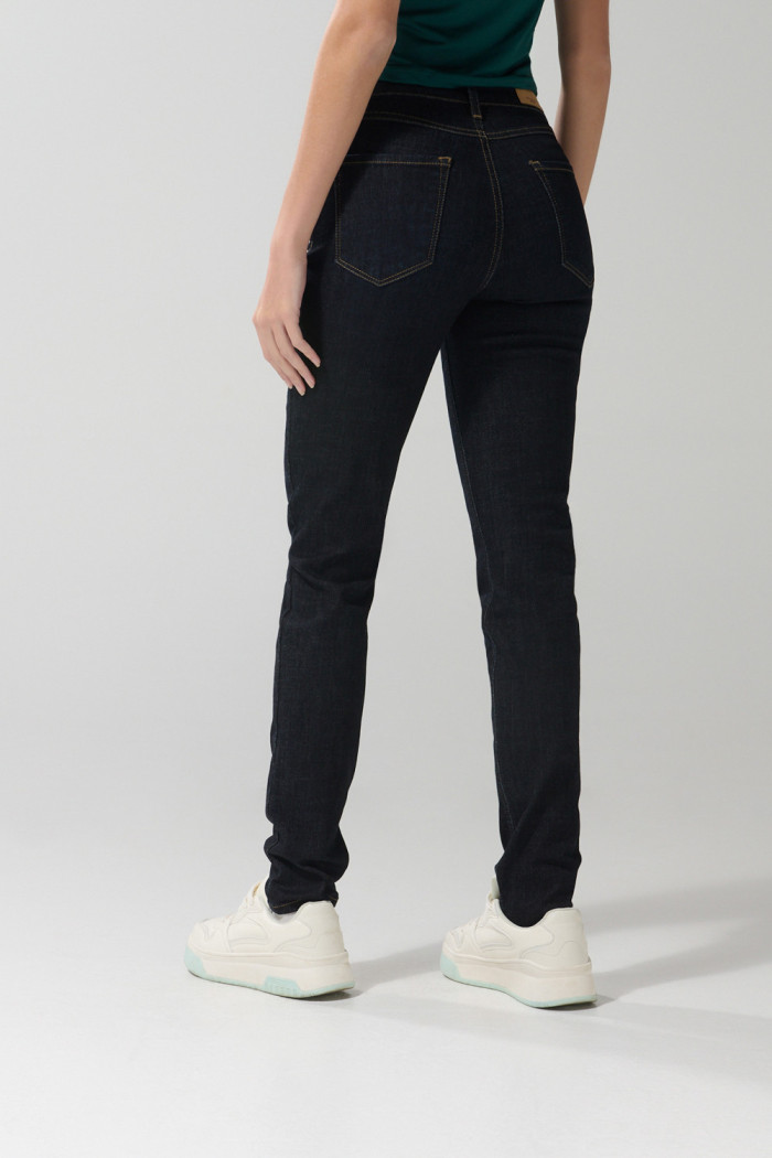 Jean tiro alto jegging ceñido azul intenso con bolsillos