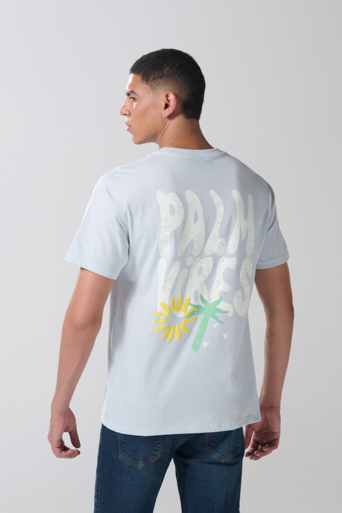 Camiseta cuello redondo unicolor con textos estampados