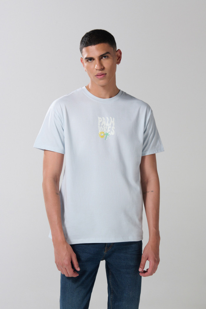 Camiseta cuello redondo unicolor con textos estampados