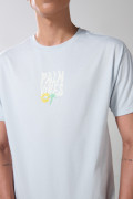 Camiseta cuello redondo unicolor con textos estampados