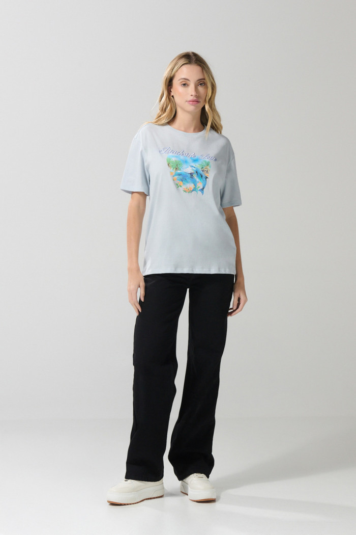 Camiseta unicolor con diseño de playa y manga corta