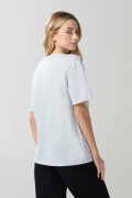 Camiseta unicolor con diseño de playa y manga corta