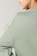 Buzo oversize cuello redondo unicolor con costura decorativa