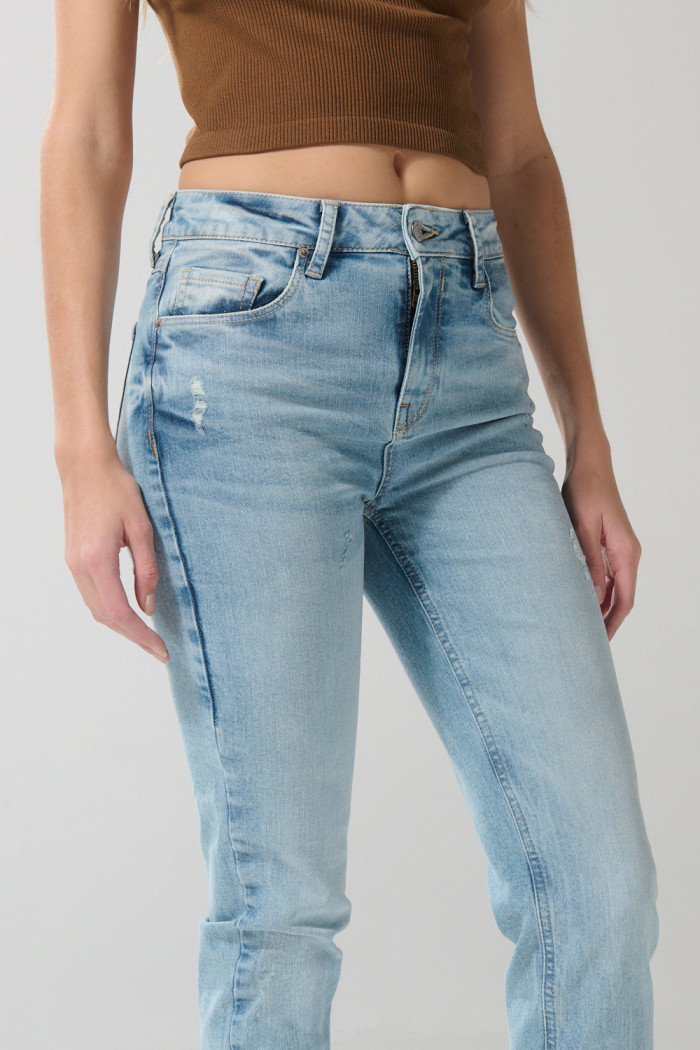 Jean tiro alto jegging ceñido azul claro con bolsillos